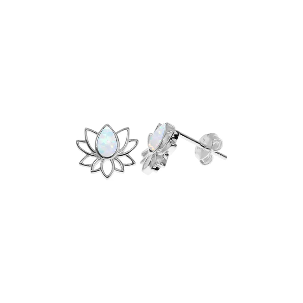 Silver lotus flower earrings with opal-like stones on a white background