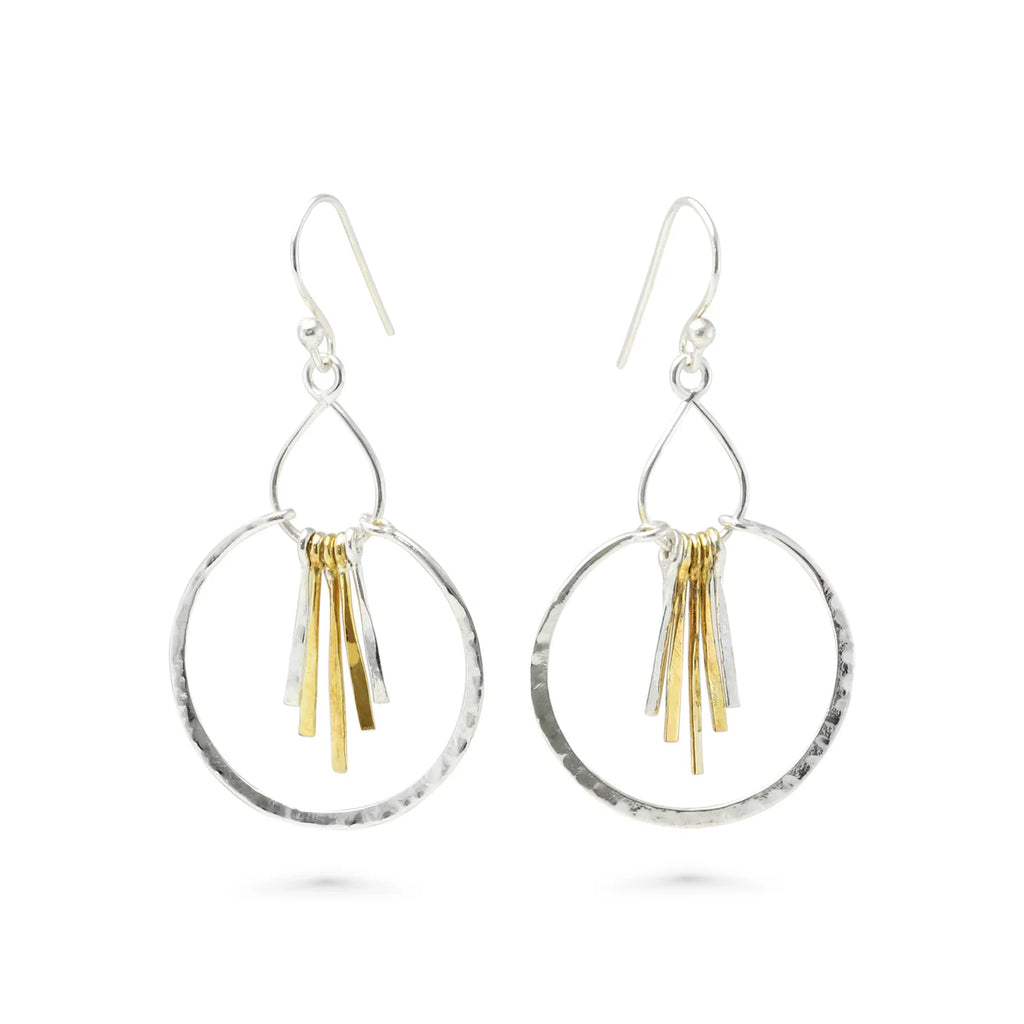 Pair of silver hoop earrings with gold dangling elements on a white background